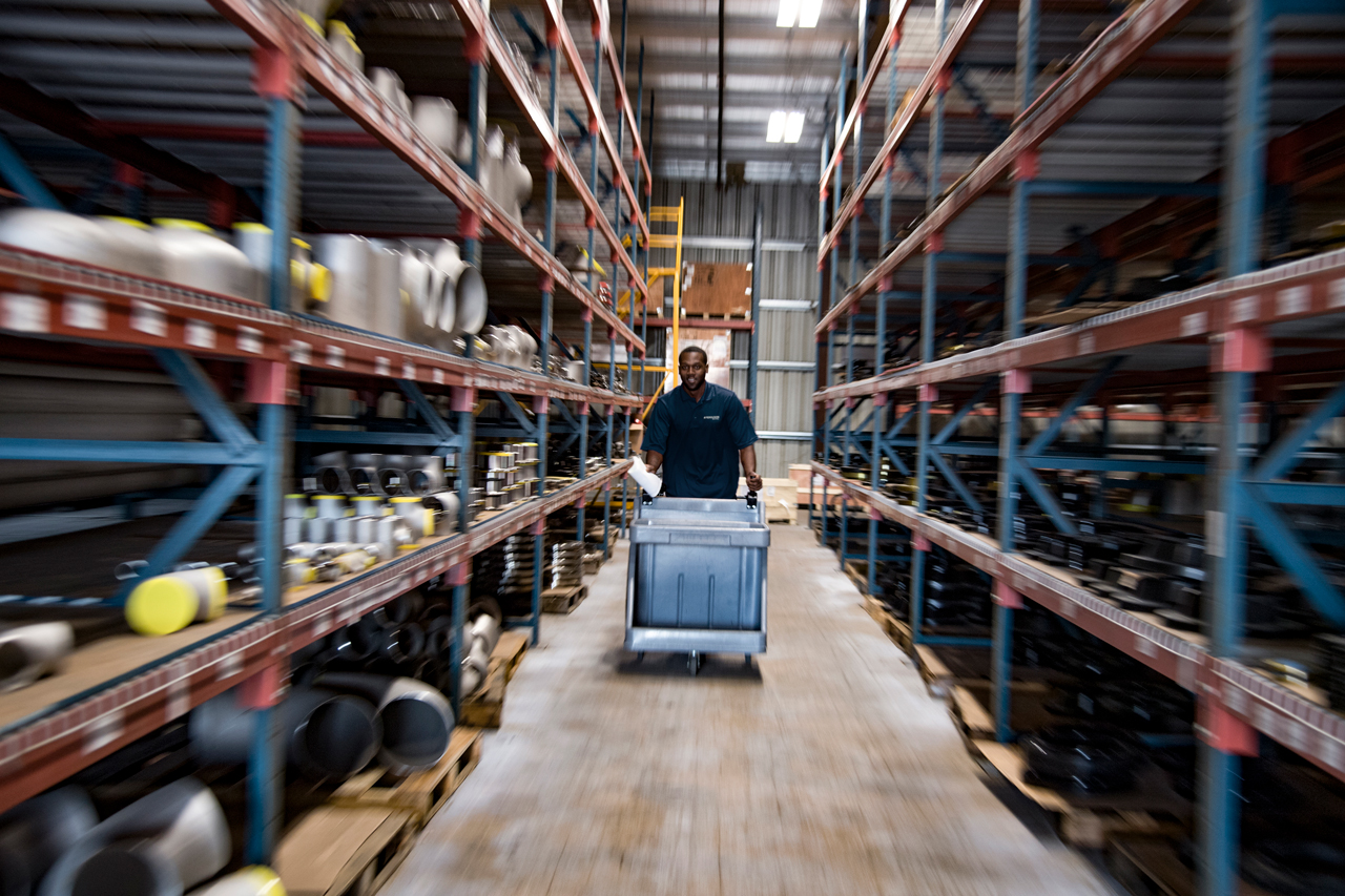 A Ferguson Industrial warehouse showcasing the extensive inventory of industrial PVF products.