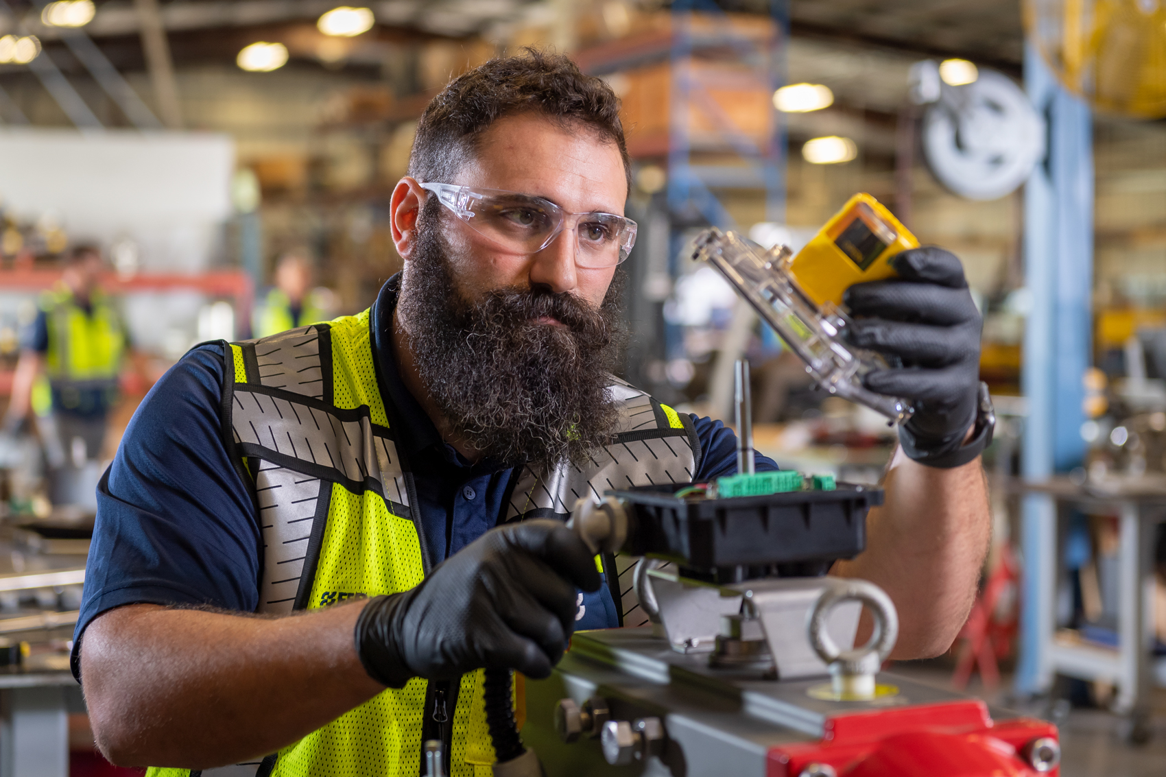 Ferguson Industrial engineer testing a flow control valve.