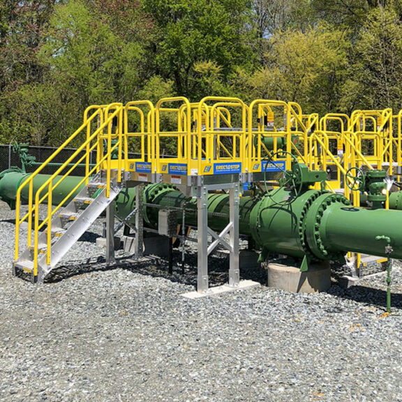 The Erectastep system being used in an industry piping application